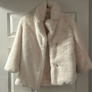 Youth, size 8-9 y fuzzy white coat. Like new condition, worn once.